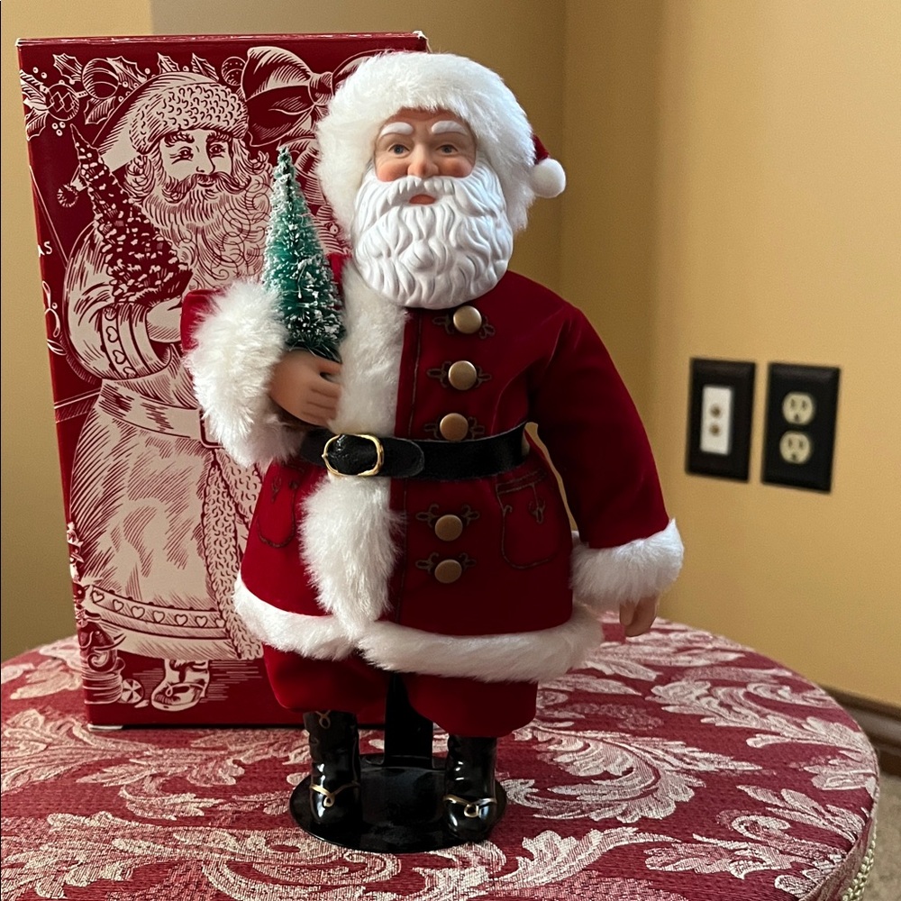 Avon Christmas with Santa Porcelain doll